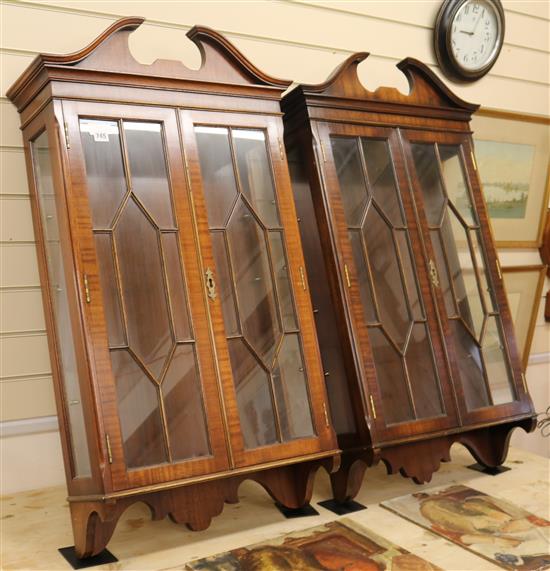 A pair of mahogany wall hanging display cabinets, W.62cm H.112cm